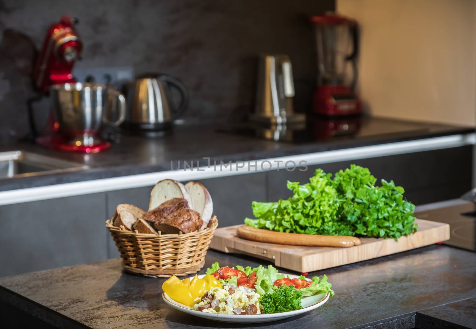 Omelet with herbs and vegetables on a gray table by sveter