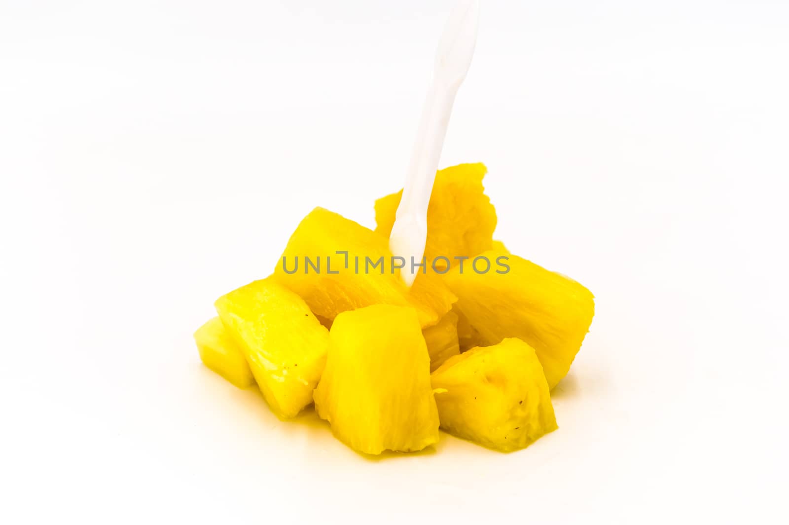 Pineapple pieces isolated on white background
