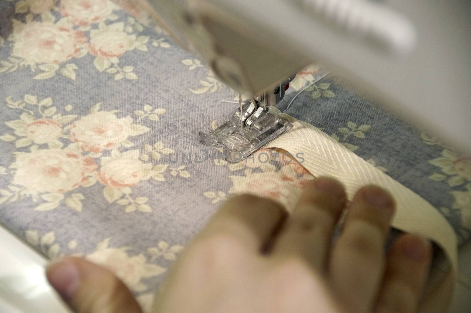 the process of handmade creating of the diary from special scrapbooking paper, paper flowers and other decorative elements