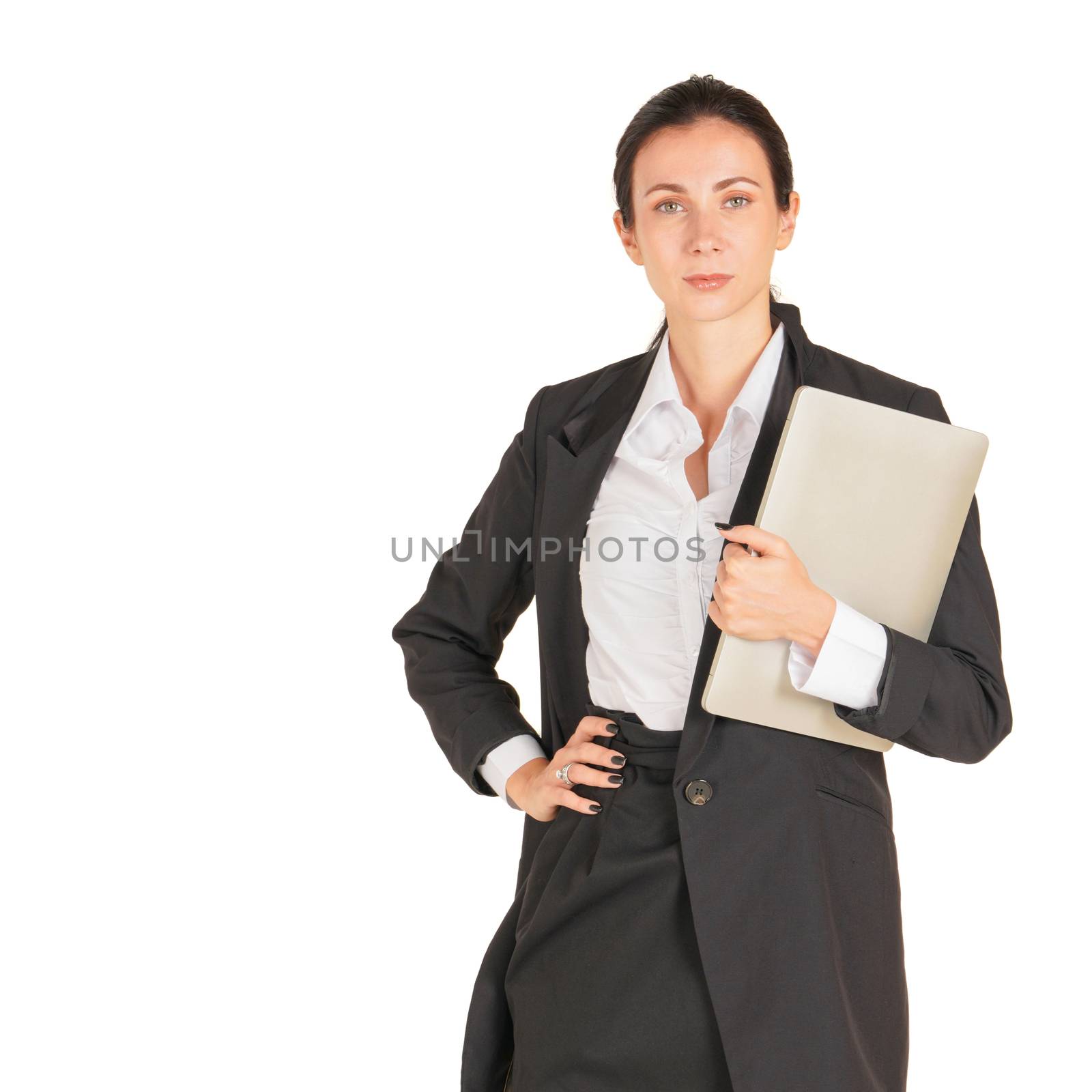 A business woman in a black suit holding on a computer notebook. by chadchai_k