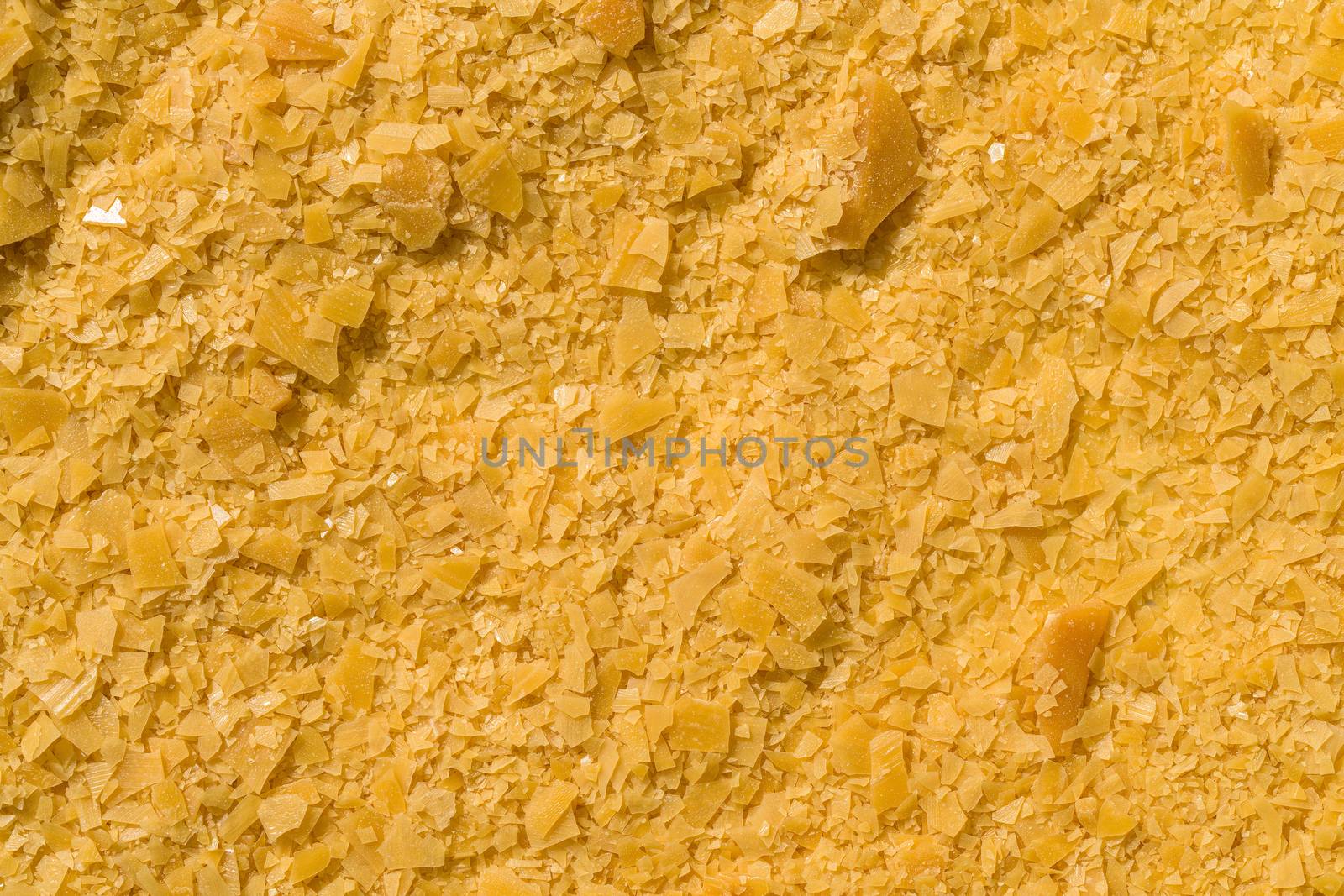 Organic Carnauba Wax come in the form of hard yellow flakes and is widely used in cosmetics by chadchai_k