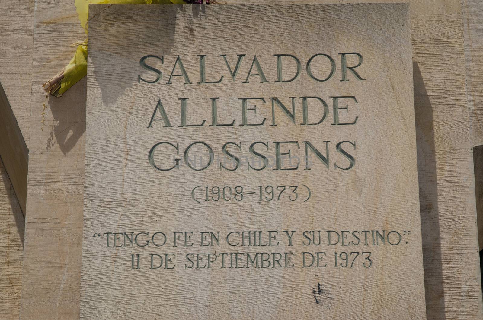 Plaque of the statue of Salvador Allende, former president of Chile. The Constitucion Square. Santiago de Chile. Chile.