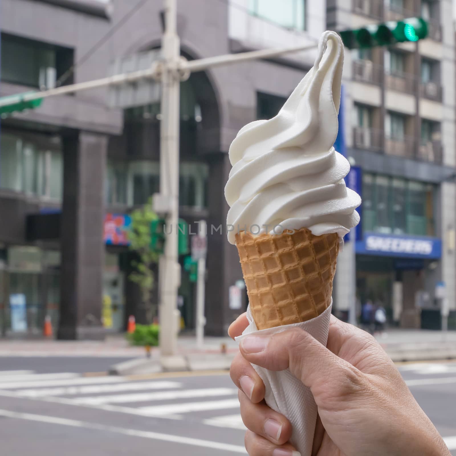 The delicious ice cream cone on hand at street in Taipei city, Taiwan.