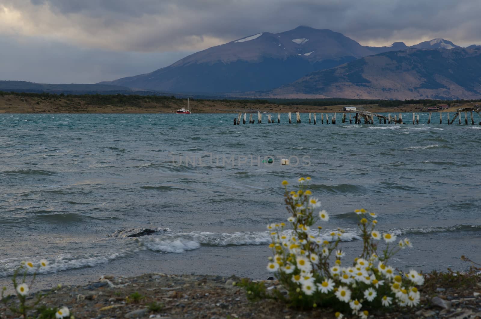 Ultima Esperanza Inlet and Sarmiento Mountain Range from Puerto Natales. by VictorSuarez