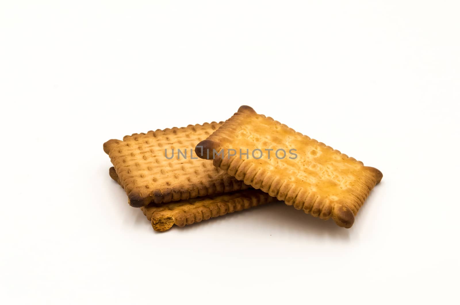 Small butter cookies close up front view on a white background