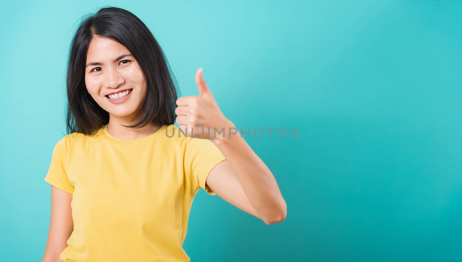 Portrait Asian beautiful young woman standing, She made finger t by Sorapop