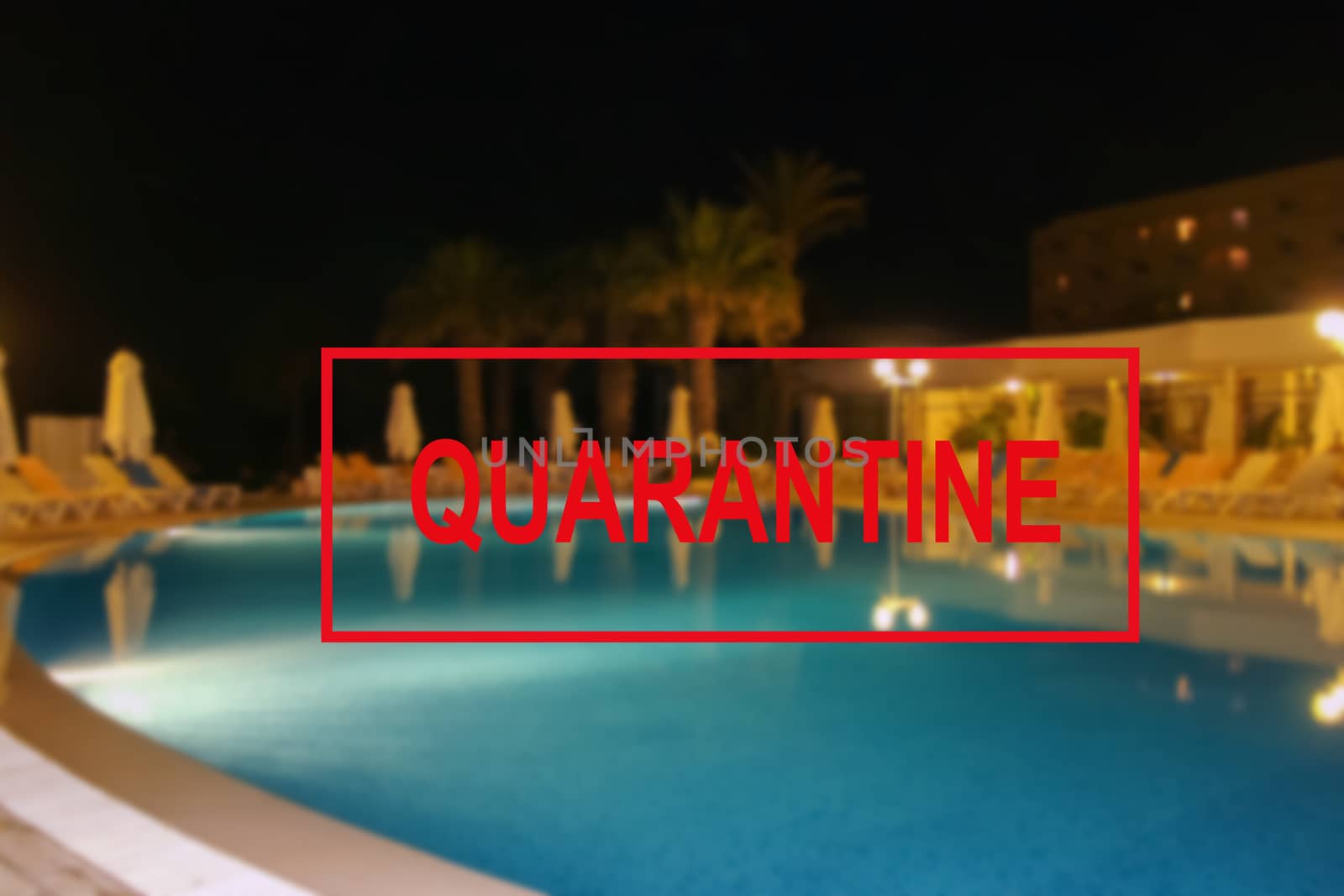 Text of the quarantine against the background of a hotel pool in Tunisia, the concept of the collapse of the tourism industry. The sea coast is closed to tourists for quarantine