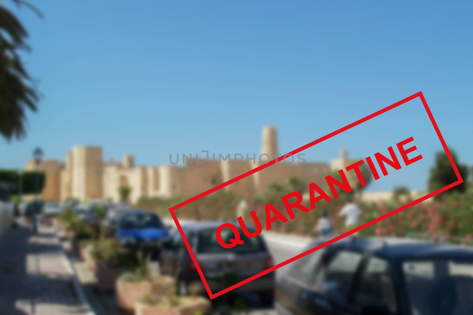 Text of the quarantine against the background of urban architecture in Tunisia, tourist attractions are closed due to a new outbreak of coronavirus. The concept of the collapse of the tourism industry.