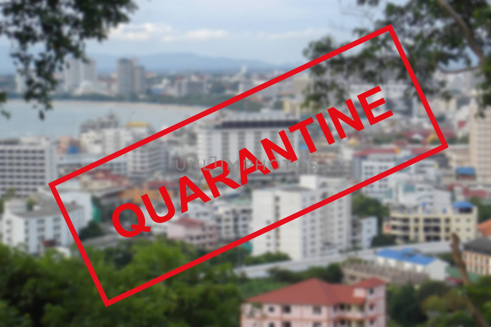 Text warning about quarantine against the background of a Bay view in Pattaya, Thailand. The concept of the collapse of the tourism industry. The sea coast is closed to tourists for quarantine