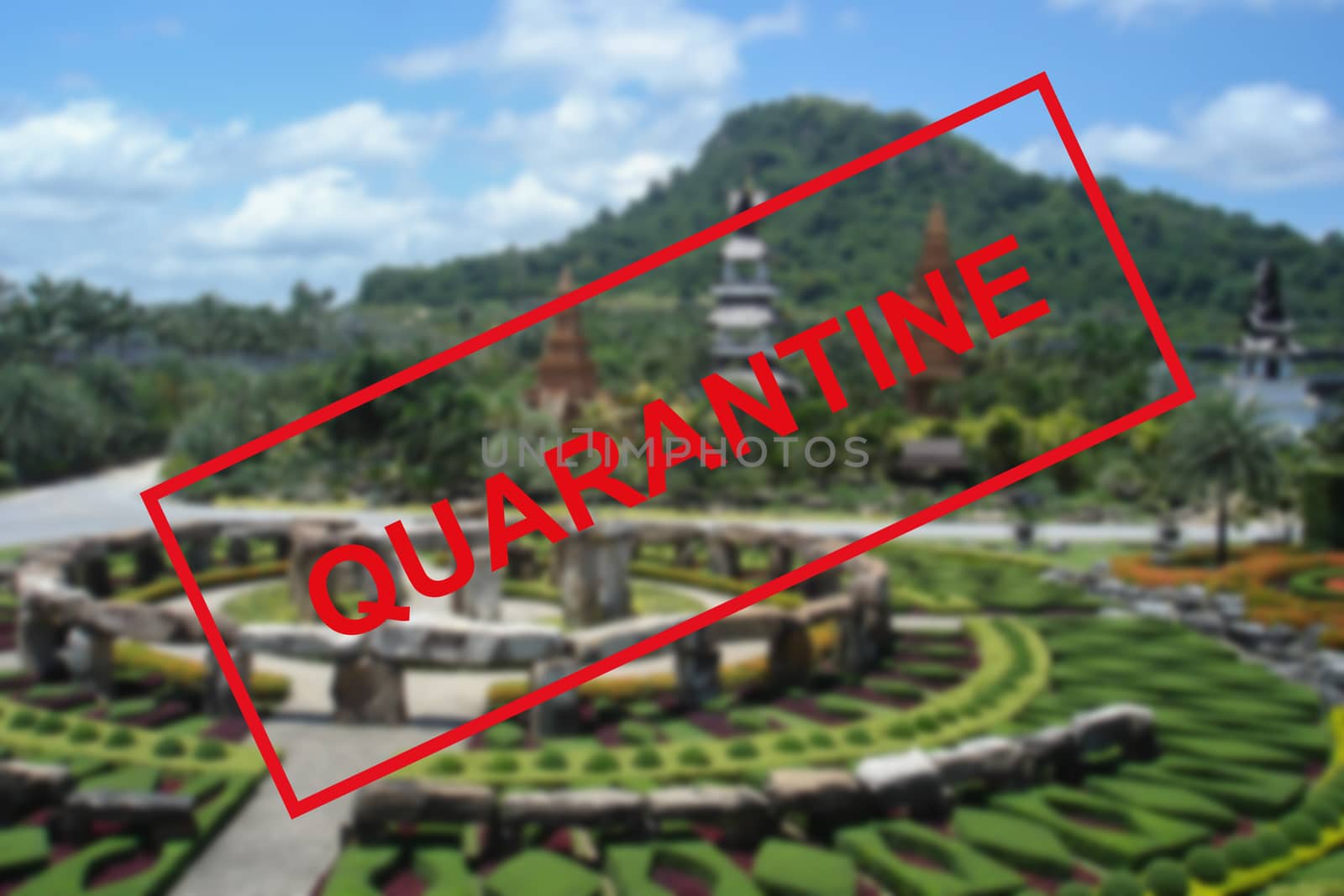 Text warning about quarantine against the background of Buddhist architecture in Pattaya, Thailand. by bonilook