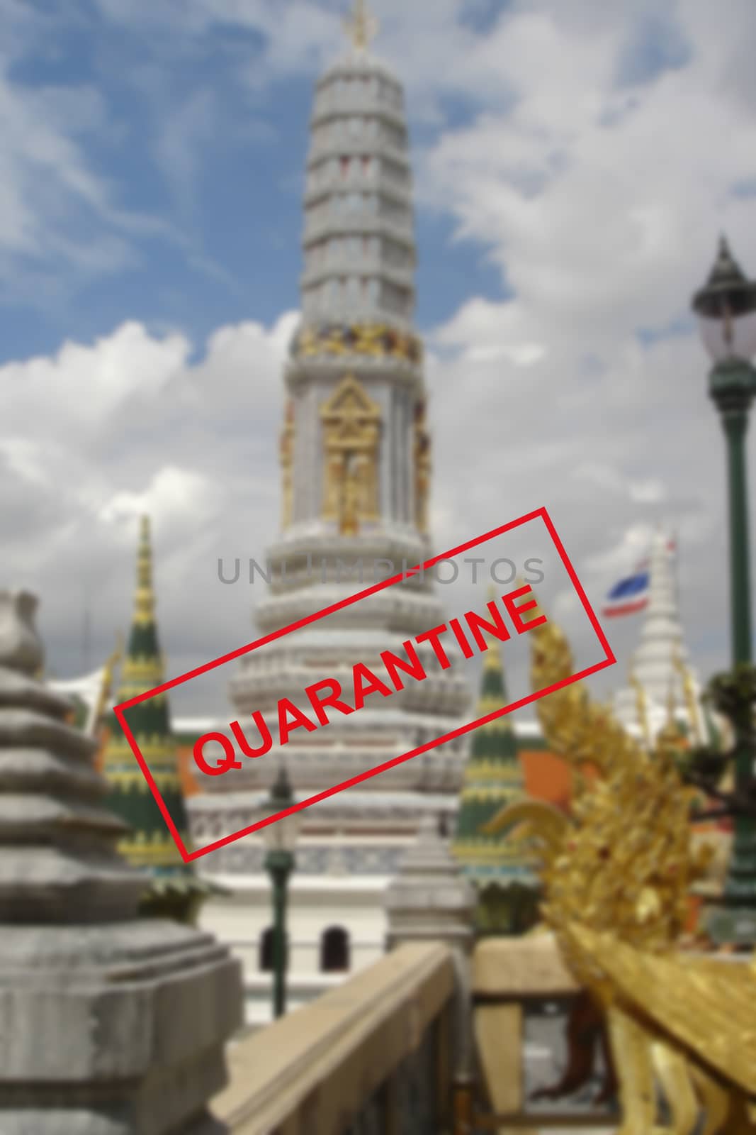 Text warning about quarantine against the background of Buddhist architecture in Pattaya, Thailand. The concept of the collapse of the tourism industry. The sea coast is closed to tourists for quarantine