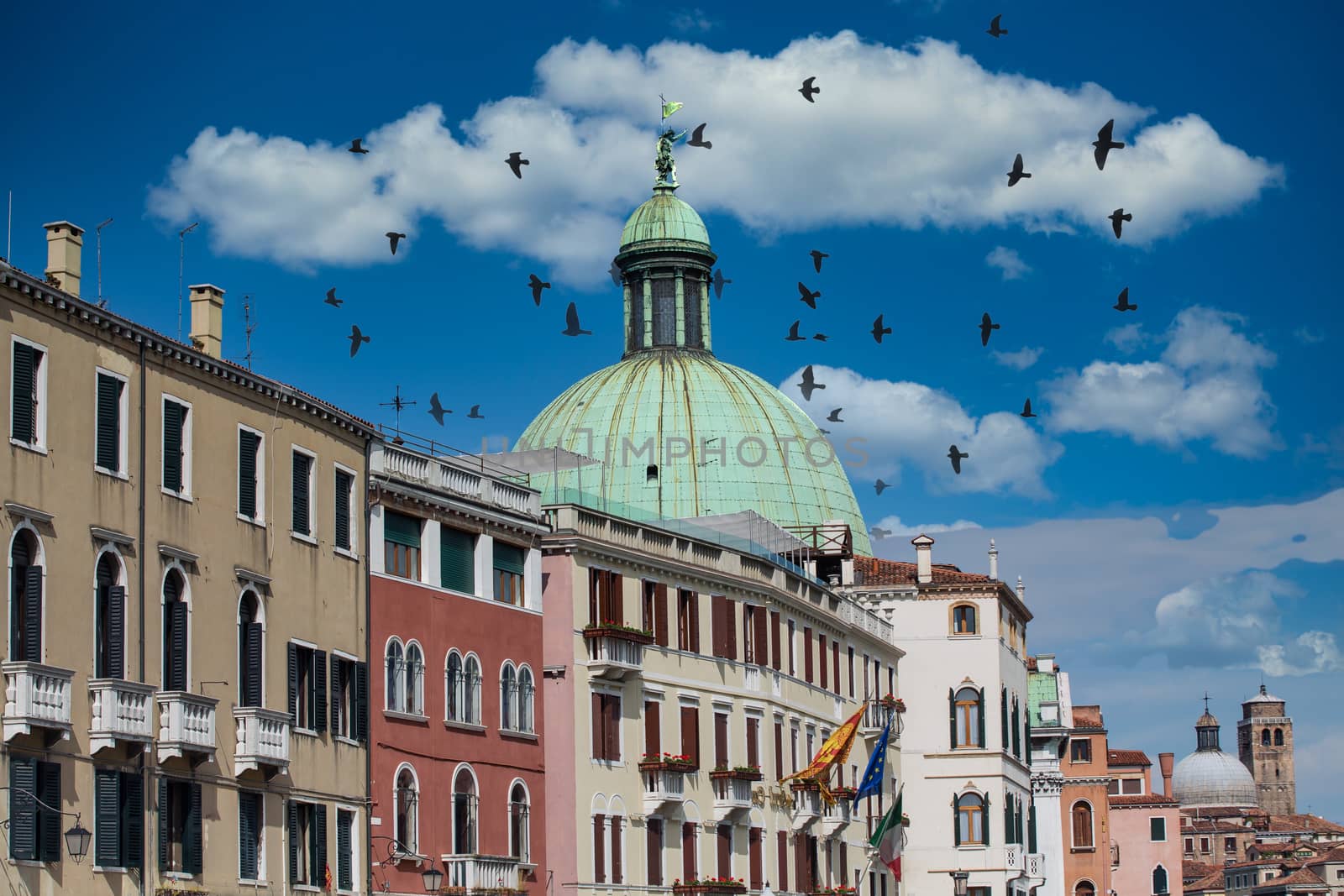 Line of Colorful Buildings in Venice with Church Dome in Distanc by dbvirago