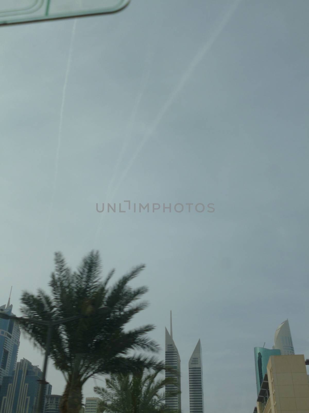 dubai skyline during the day by gswagh71