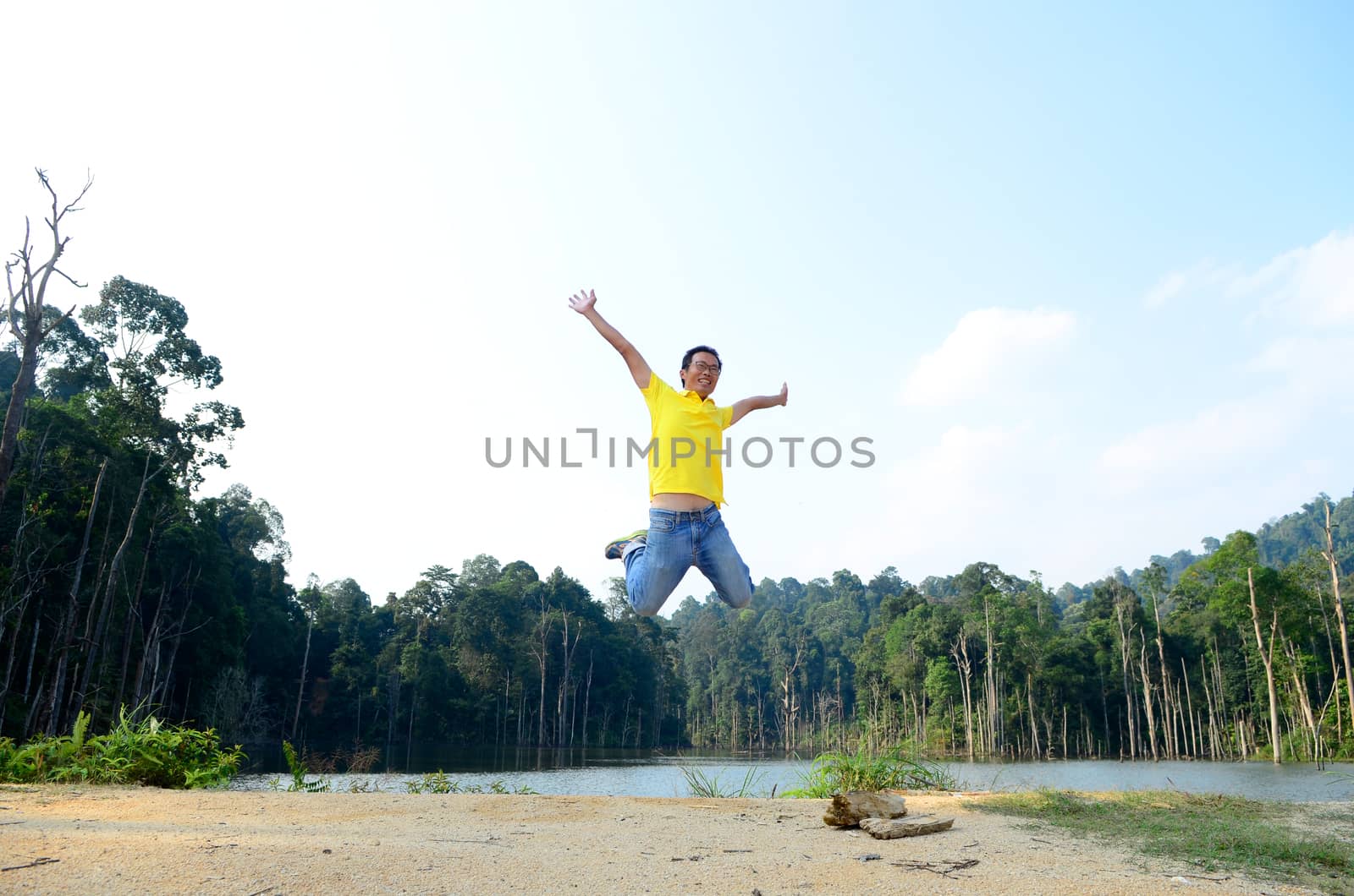 excited asian man by yongtick