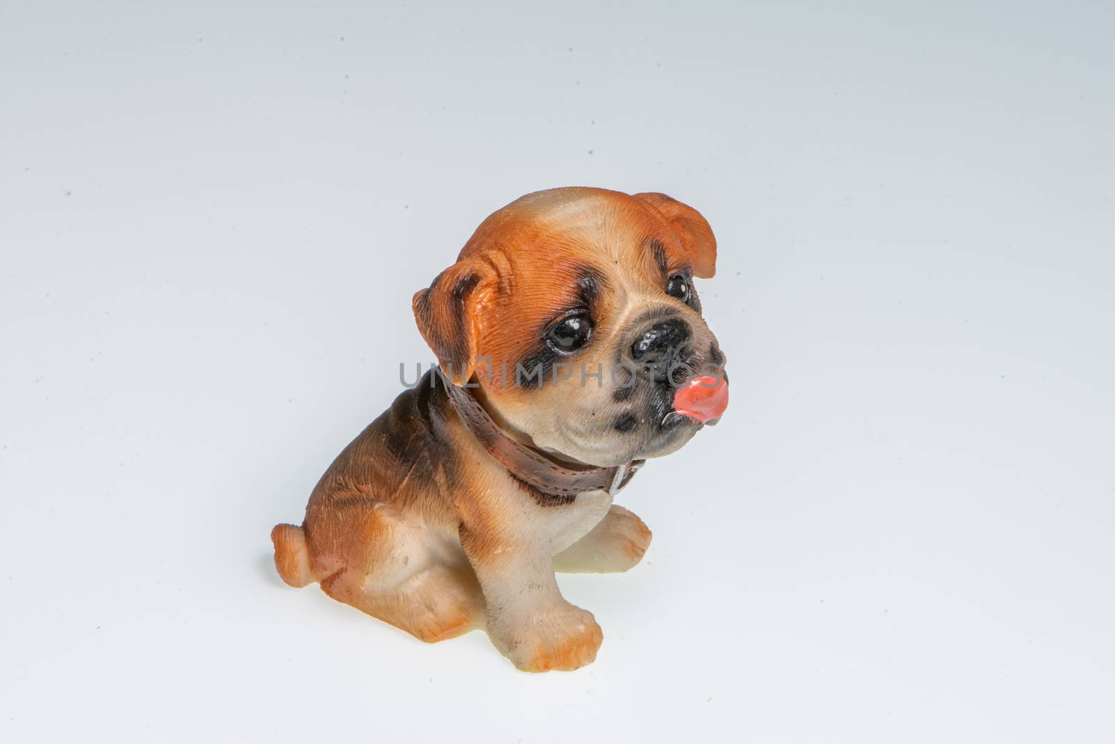 Miniature depicting an English Bulldog breed dog on a white background