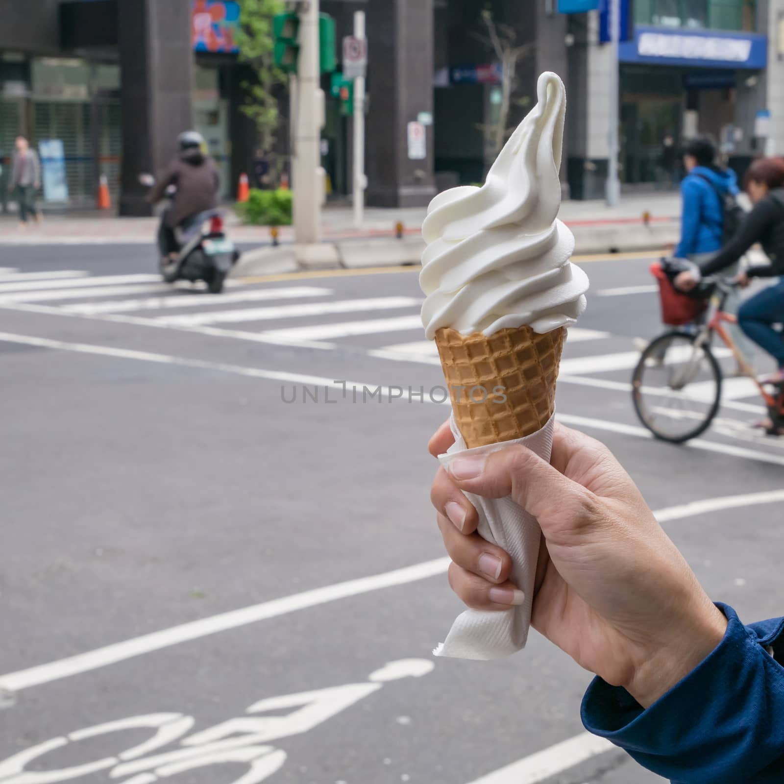 The delicious ice cream cone on hand at street in Taipei city, Taiwan.