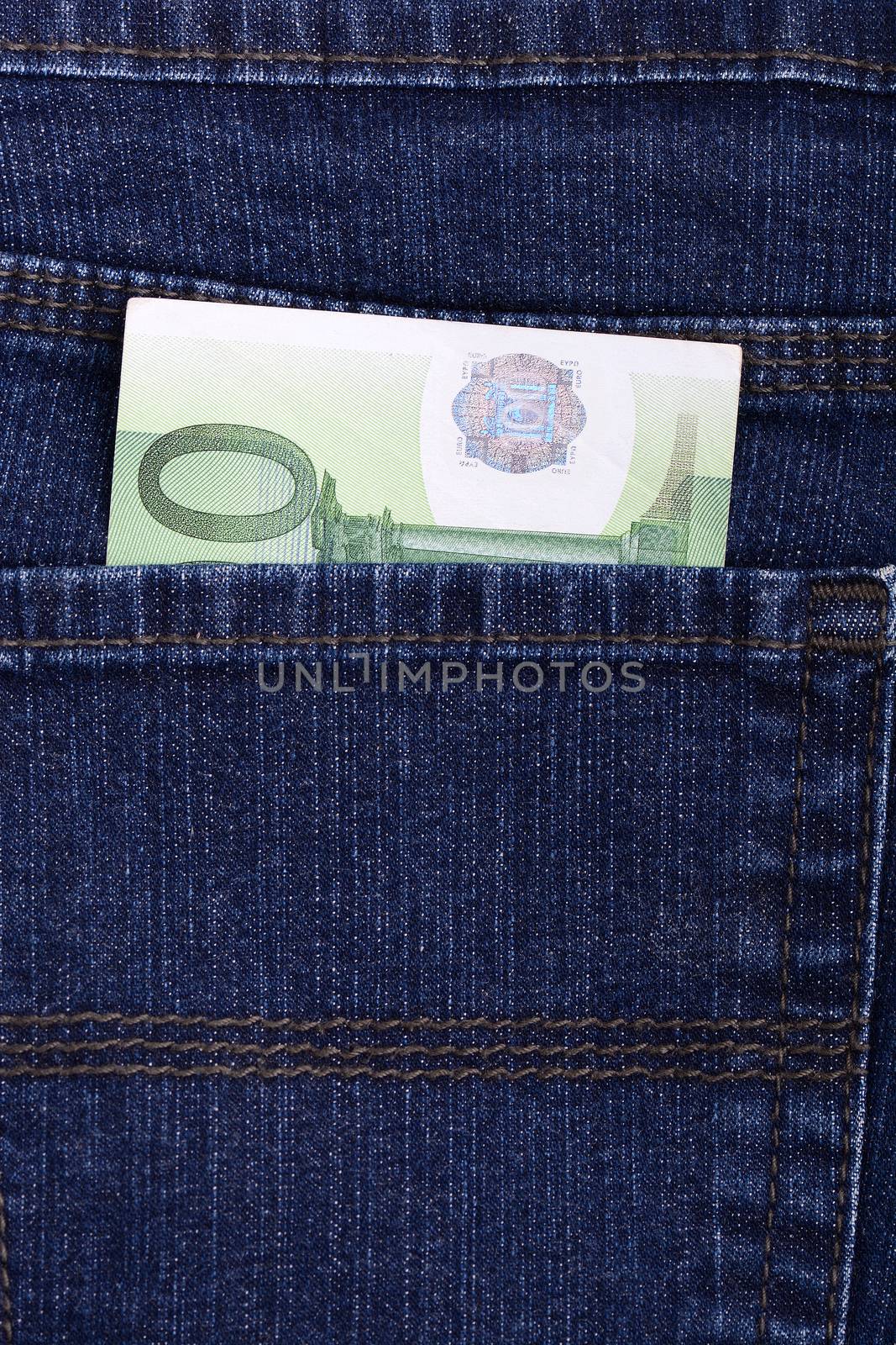 Euro notes in jeans pocket. European money. Jeans texture. Business concept