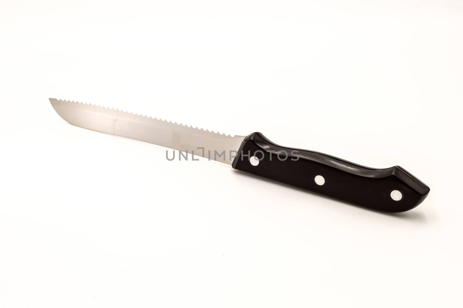 Chromium sawtooth knife with a black handle  by Philou1000