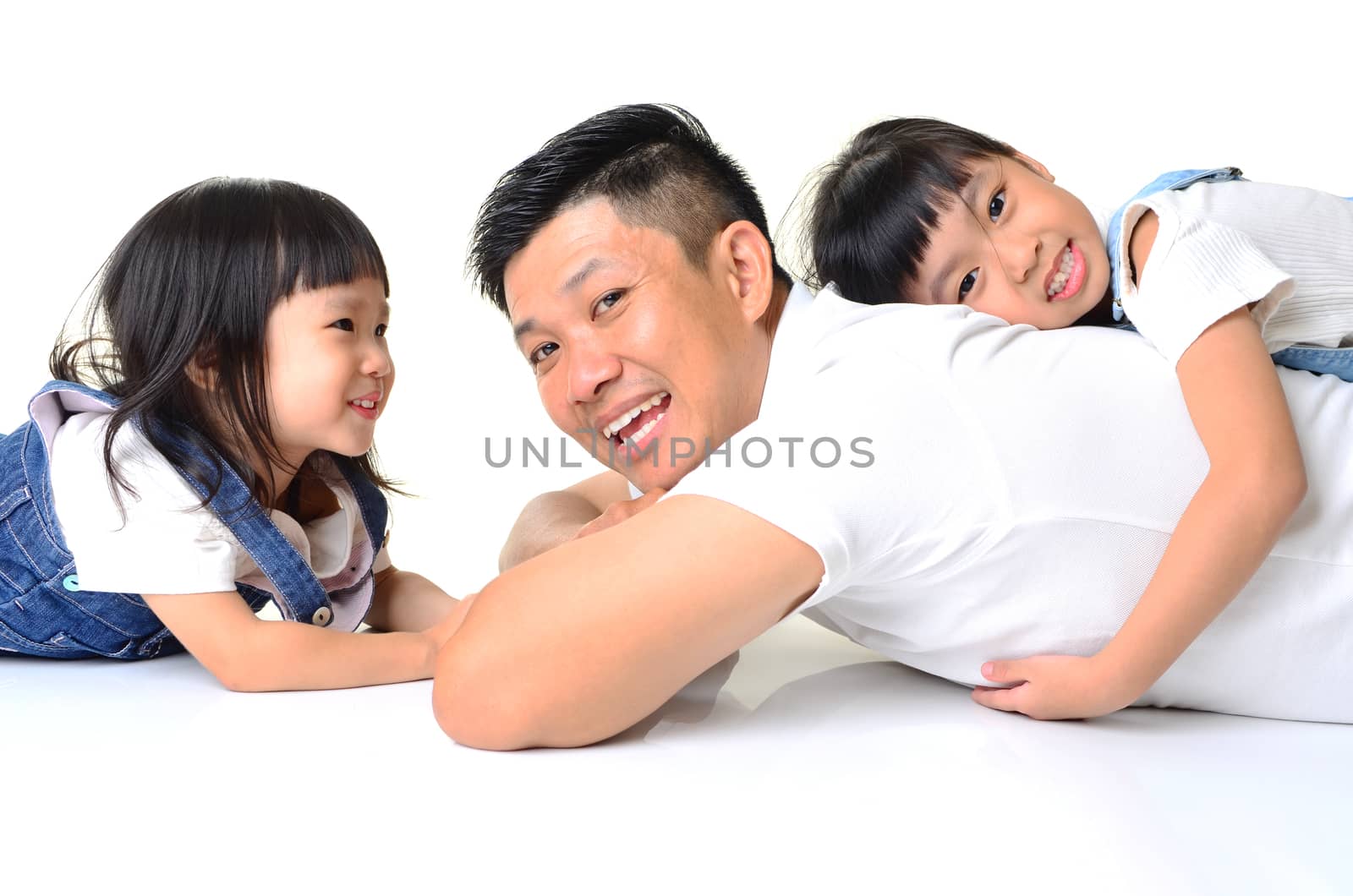 Asian father and his cute daughters  isolated on white background