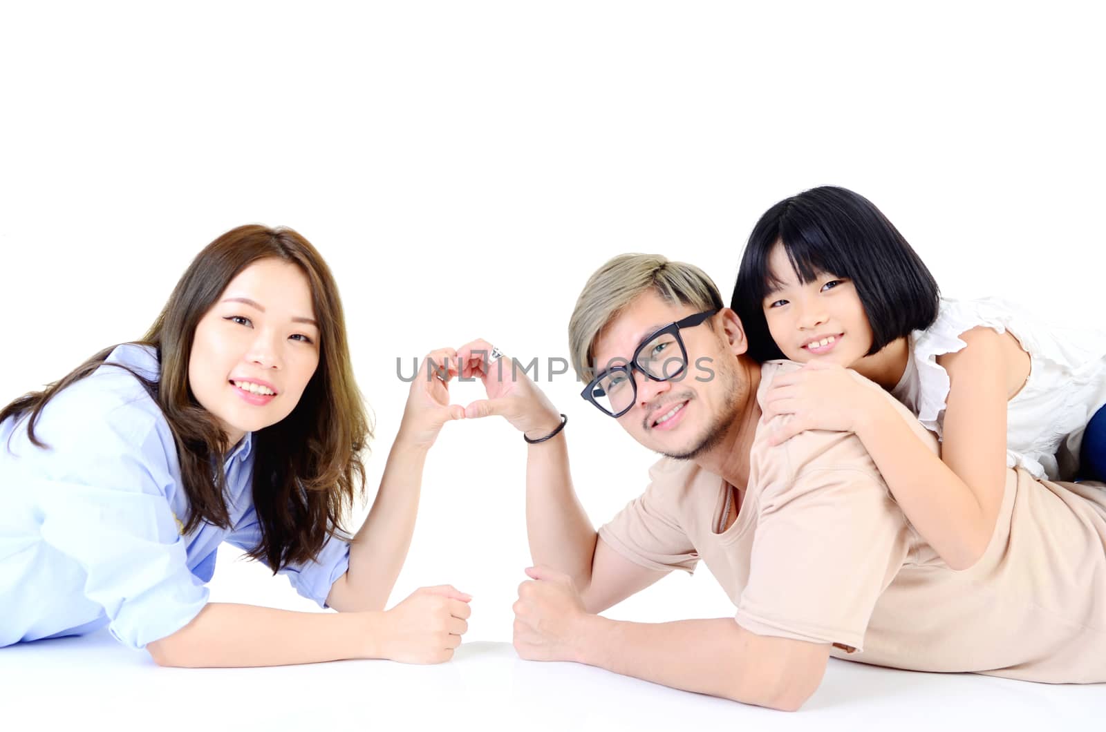 Indoor portrait of asian family at home