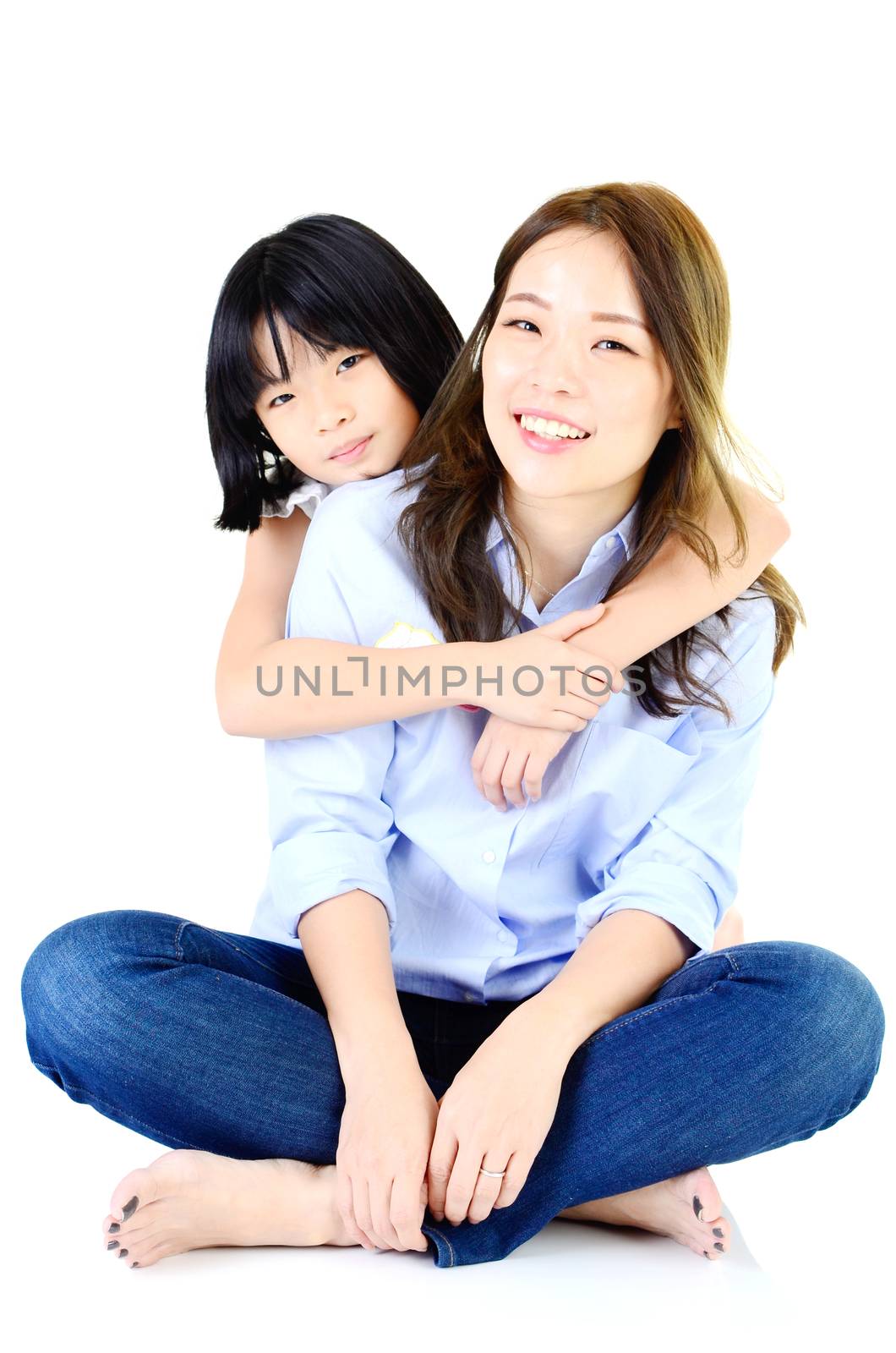Asian mother and her daughter indoor portrait