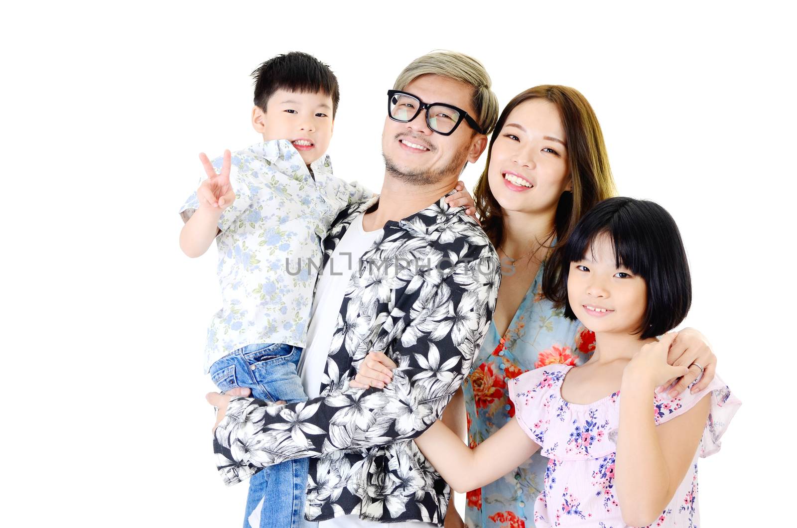 Indoor portrait of asian family at home