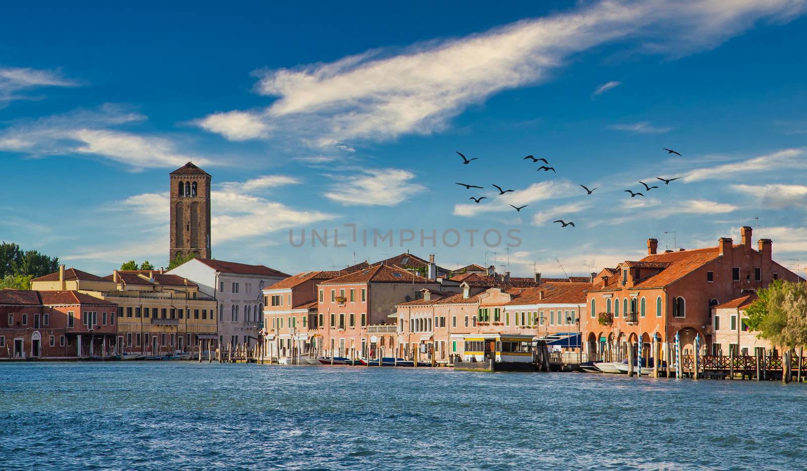 Water Bus Station near Church Tower in Venice by dbvirago