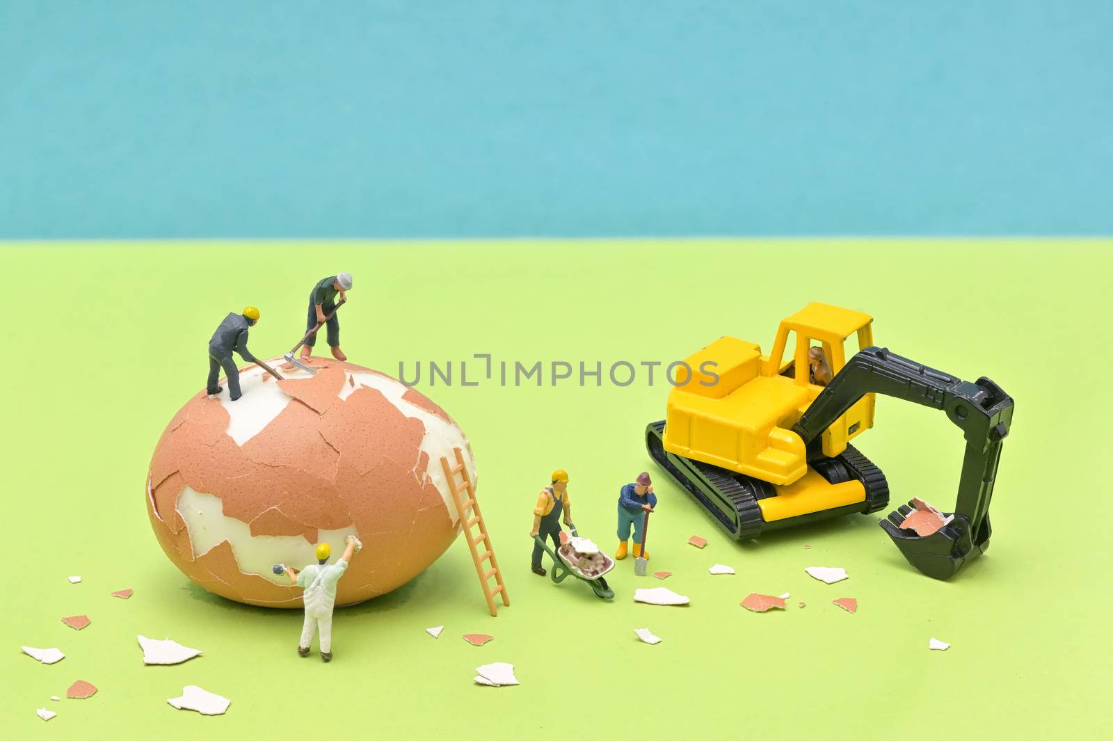 Construction Site with Miniature People Worker and Excavator