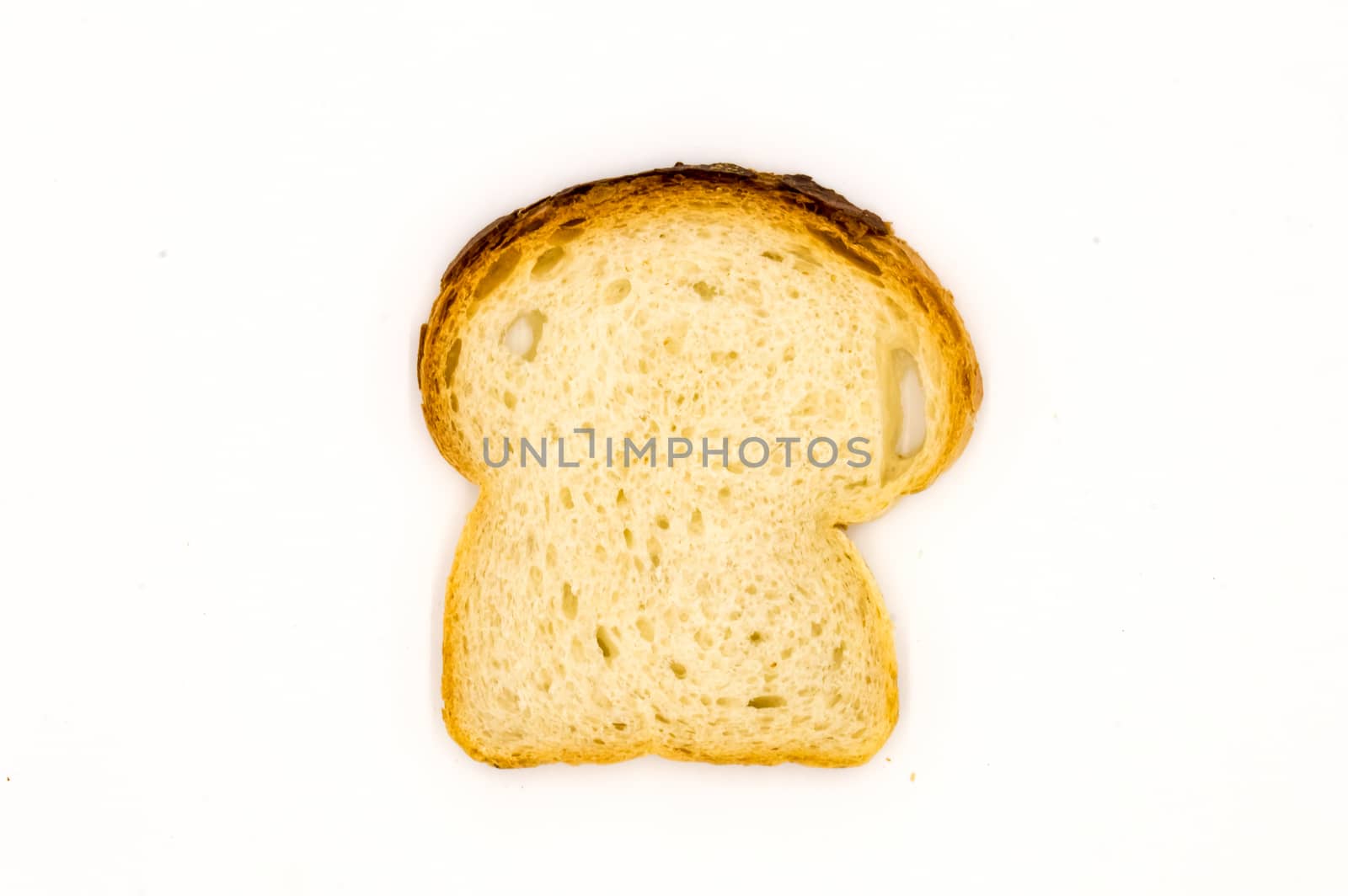 Slice of homemade bread on a white background