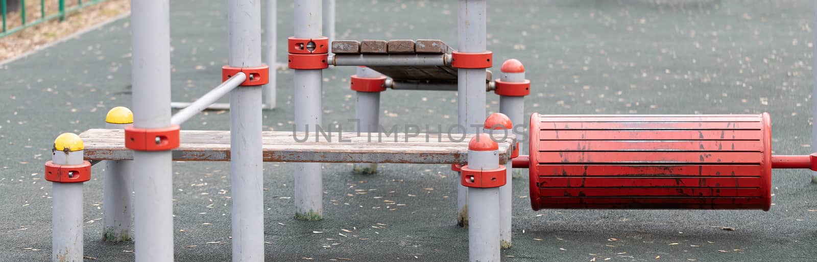 An empty modern Playground with climbing ladders on a bright Sunny spring day. An ideal place for children's outdoor activities.