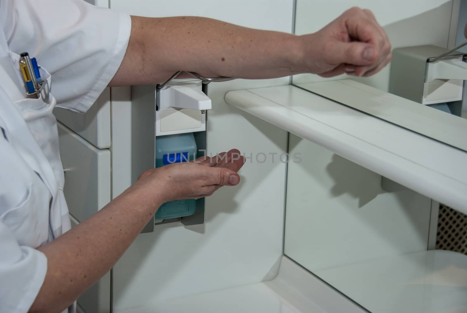 Hand hygiene for corona covid-19 and other virus prevention - proper measures to keep clean hands with alcohol gel  sanitiser on panoramic background.