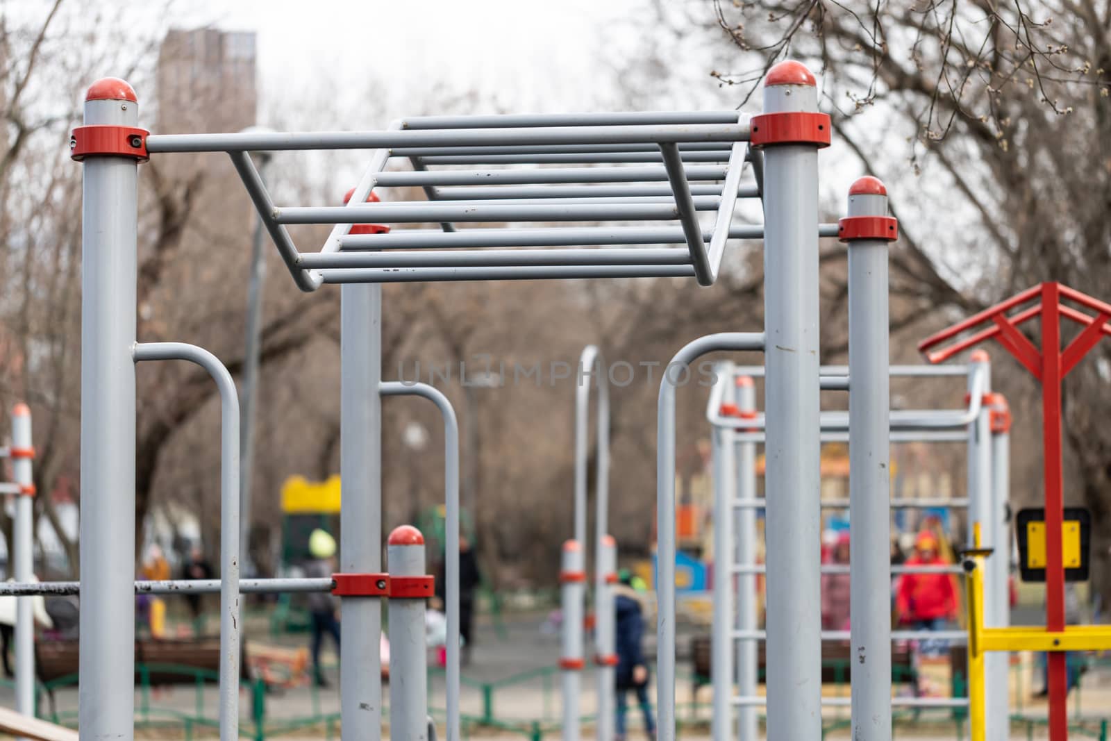 An empty modern Playground with climbing ladders on a bright Sunny spring day. An ideal place for children's outdoor activities.