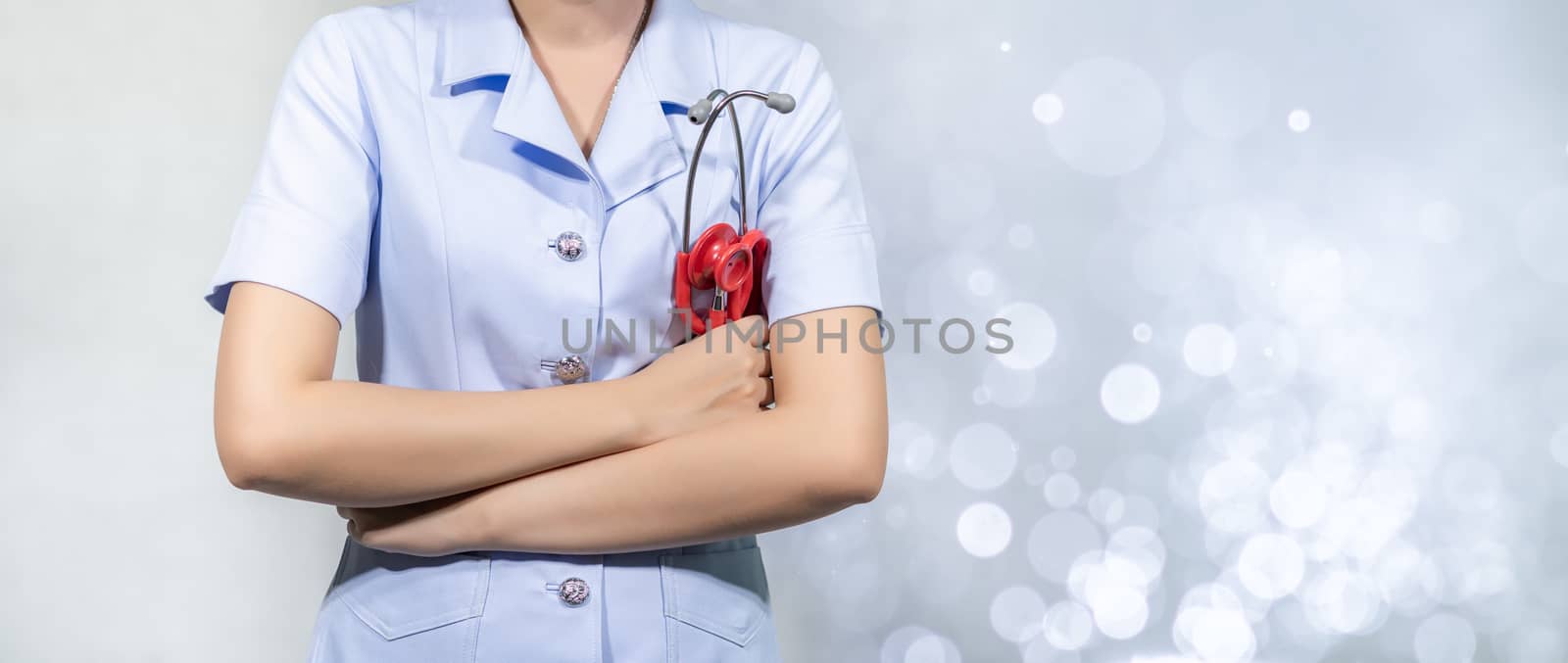 Female doctor with tools, white background