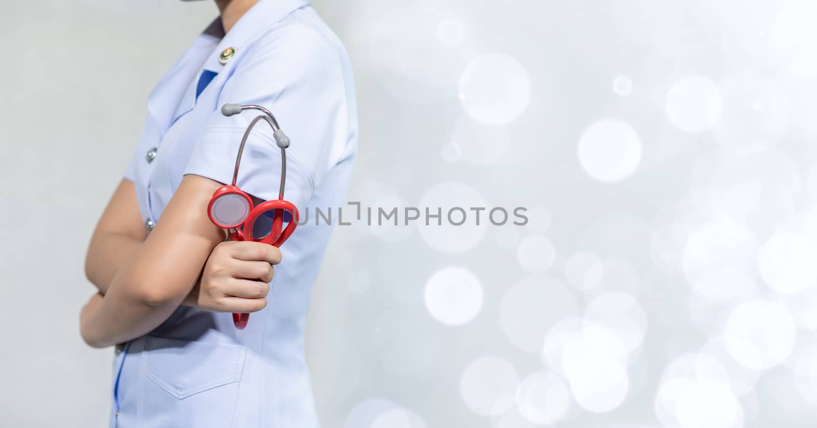 Female doctor with tools, white background by sarayut_thaneerat