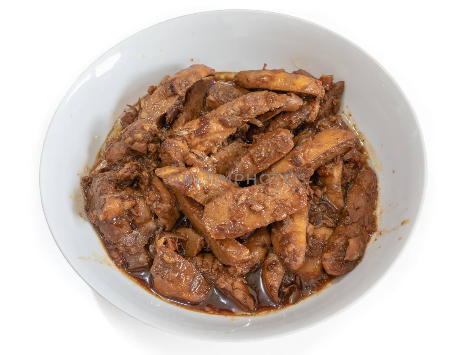 The close up of Thai fried chicken with garlic and pepper in white bowl on white background.