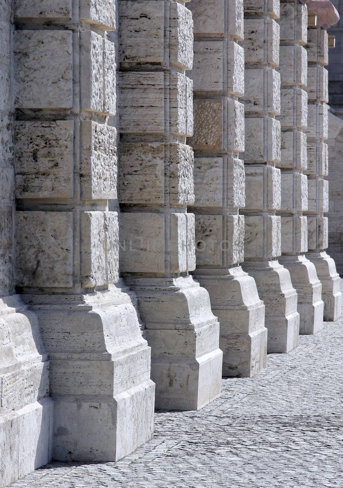 Stone colonnade background.