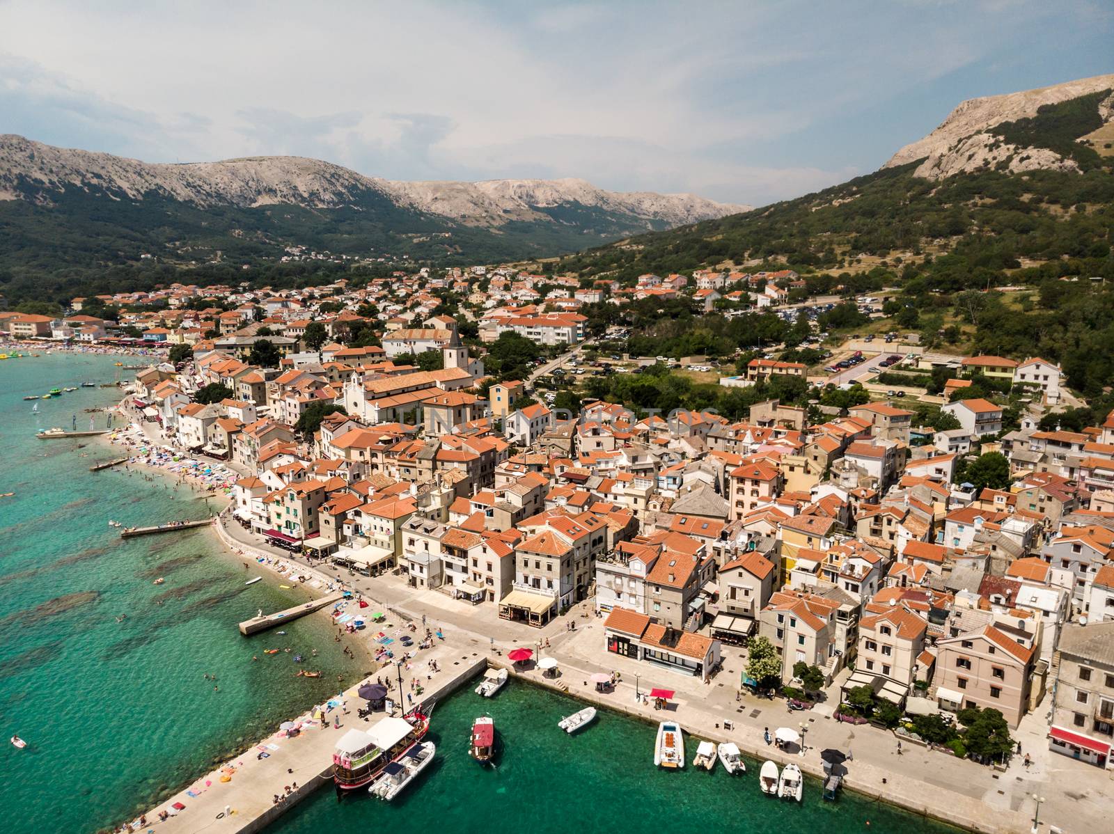 Aerial panoramic view of Baska town, popular touristic destination on island Krk, Croatia, Europe.