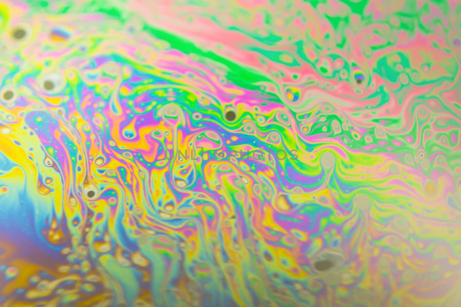 Close up soap bubble background. Psychedelic abstract background
