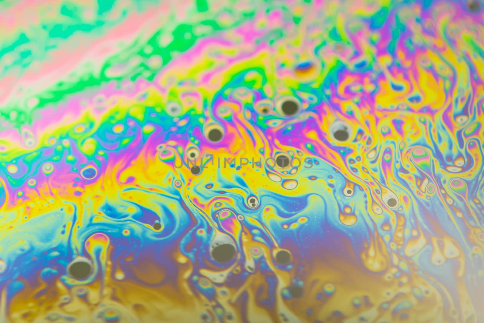 Close up soap bubble background. Psychedelic abstract background