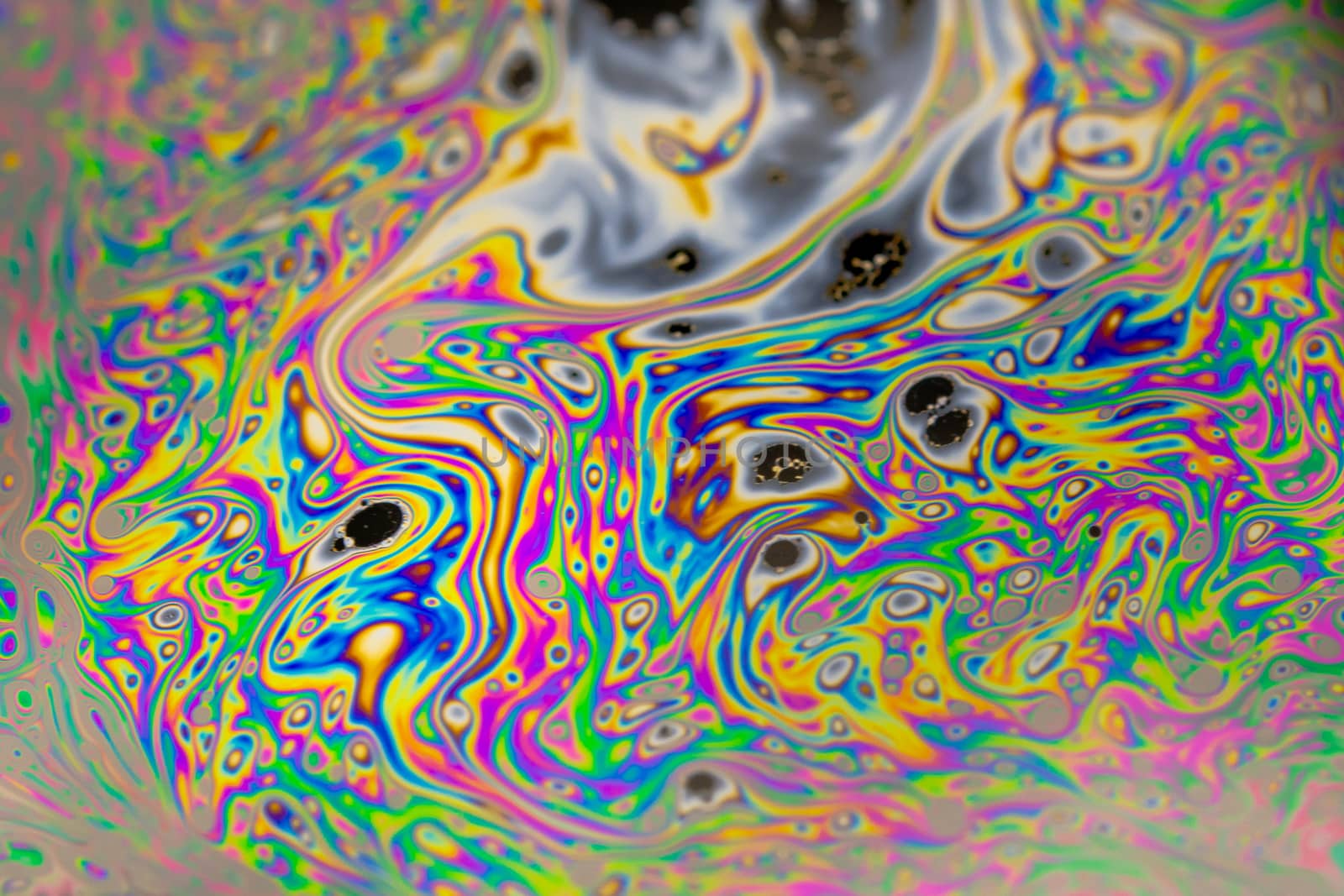 Close up soap bubble background. Psychedelic abstract background