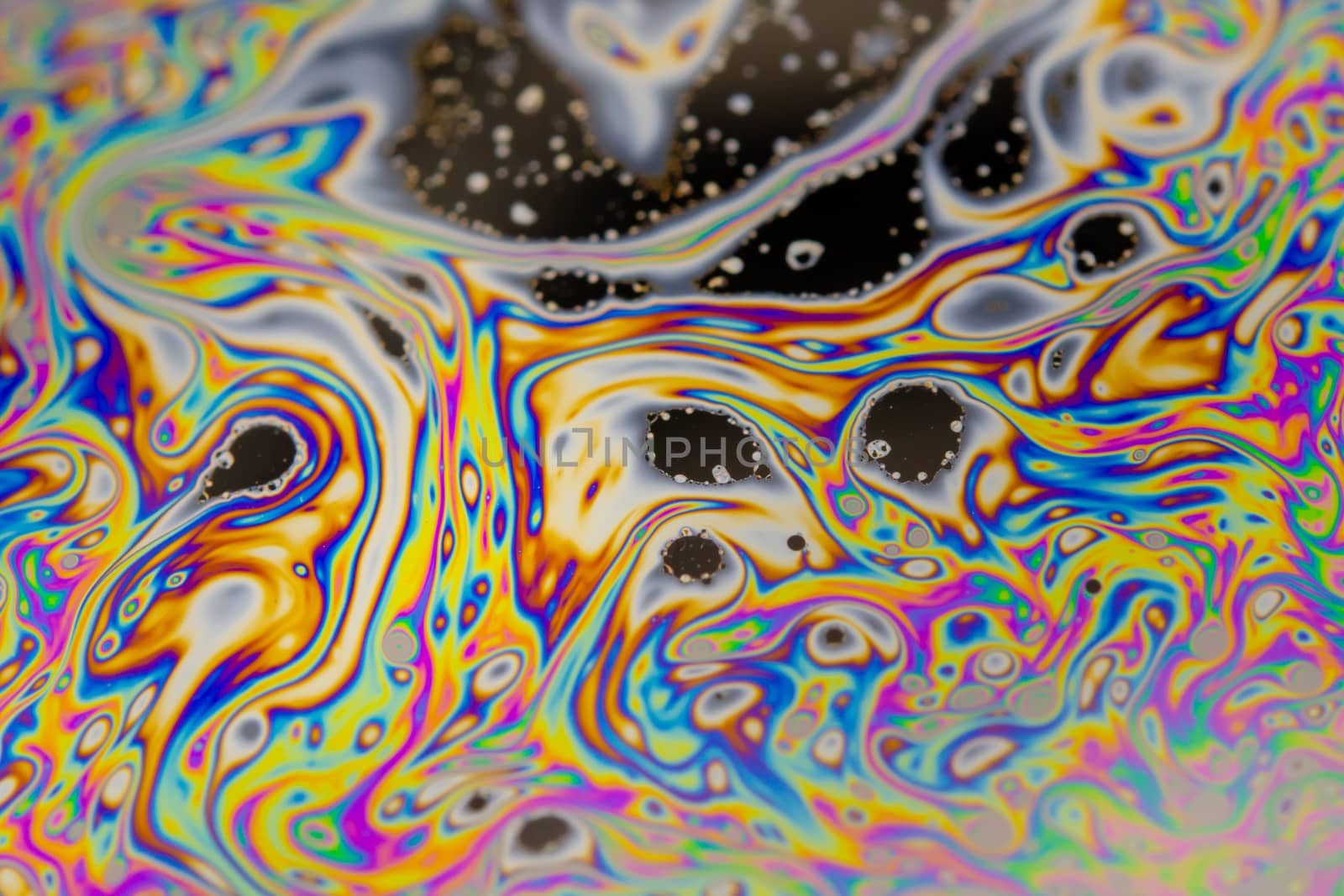 Close up soap bubble background. Psychedelic abstract background