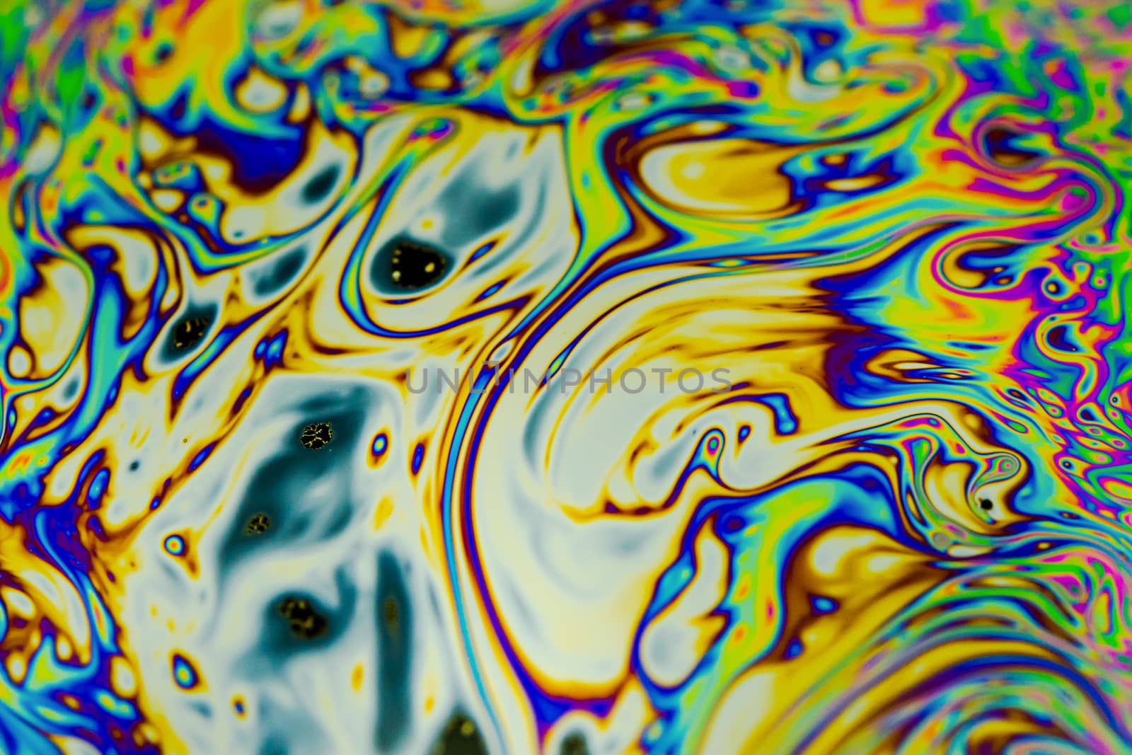 Close up soap bubble background. Psychedelic abstract background