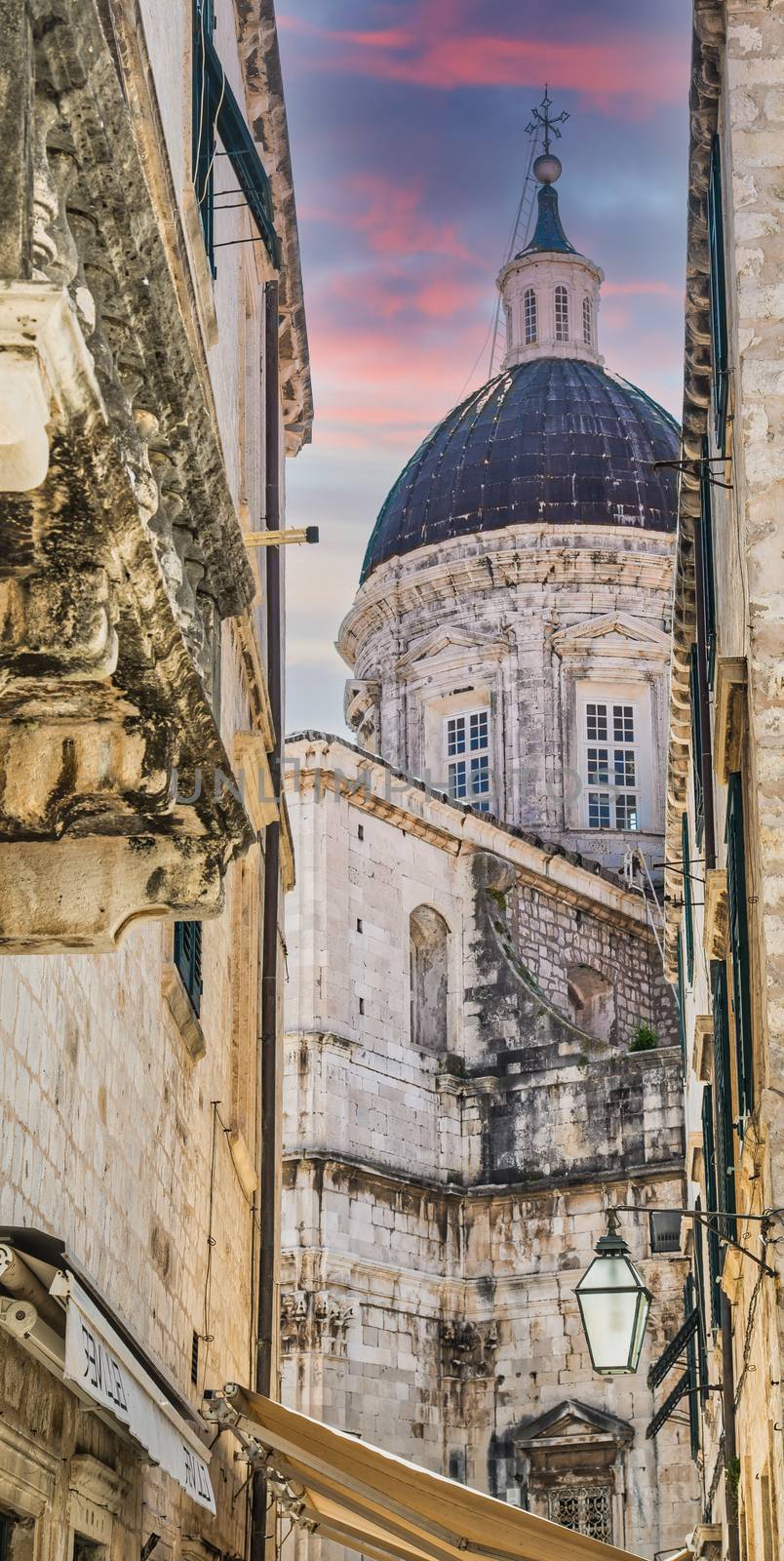 An old church dome through a narrow alley in Dubrovnik, Croatia