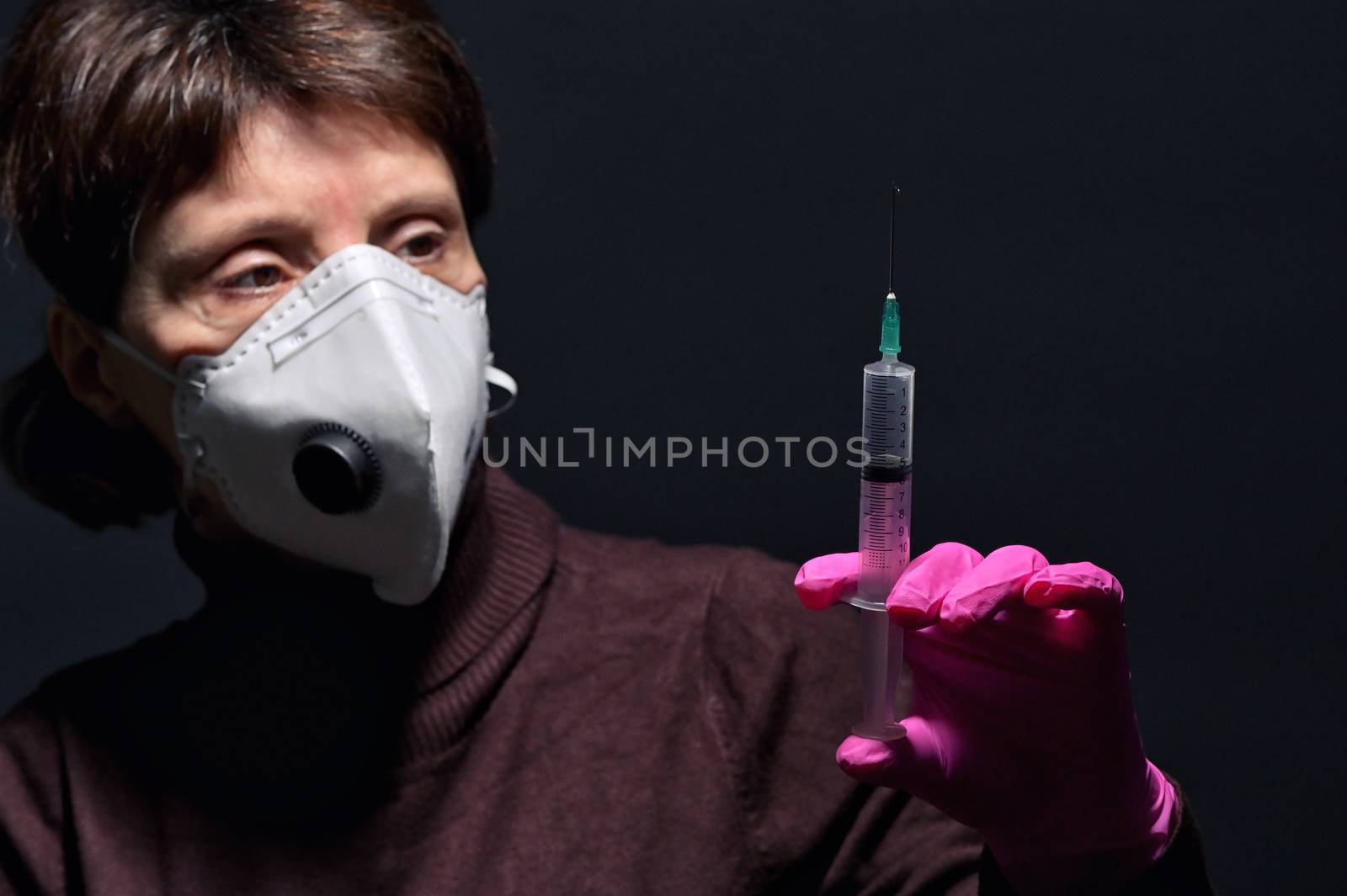 Woman Wearing Medical Protective Mask and Syringe by mady70