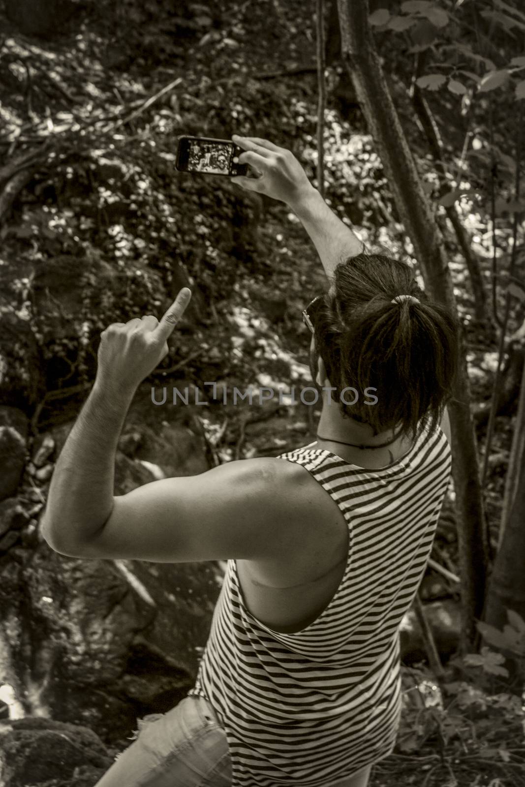 Boy takes a selfie in the woods by pippocarlot
