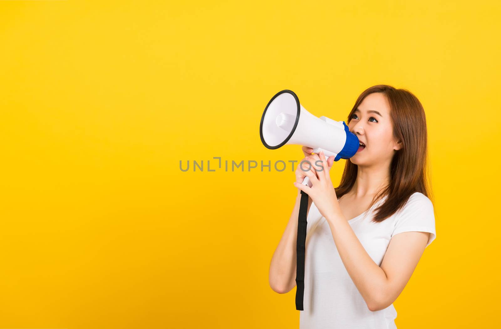 woman teen standing making announcement message shouting screami by Sorapop