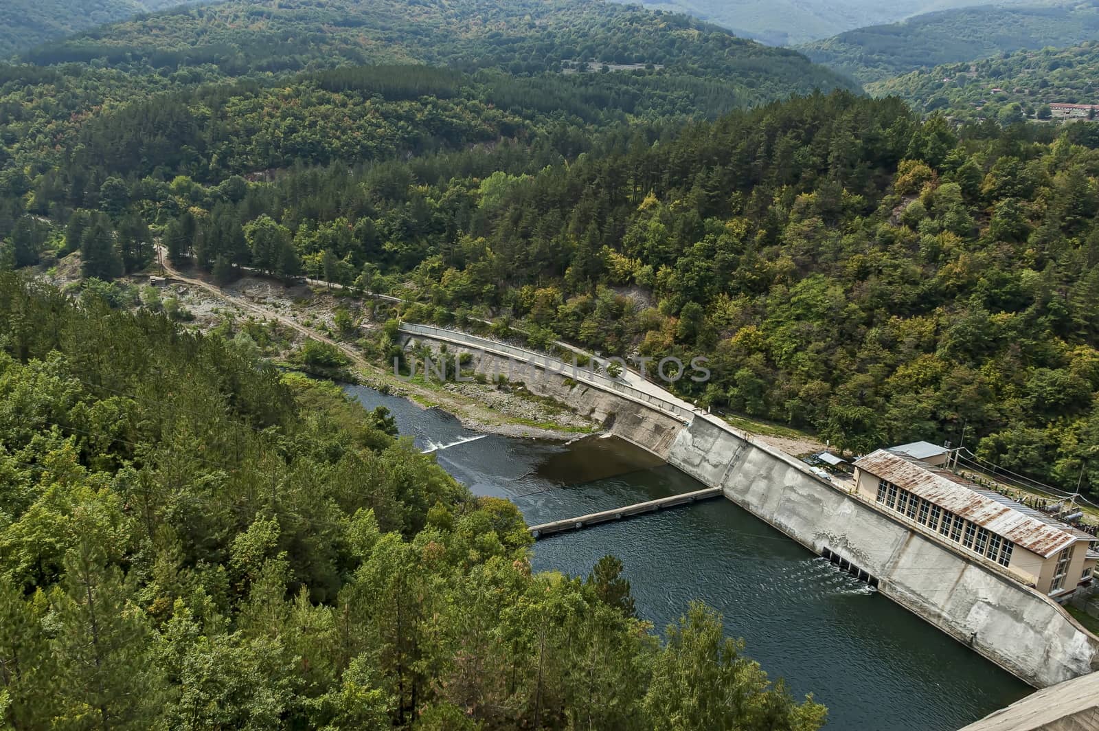 View of the old small hydro power plant and Topolnitsa dam  on the river Topolnitsa near village Muhovo, Ihtiman region, Bulgaria, Europe
