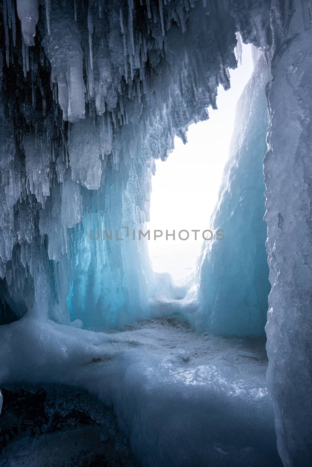 An ice cave beckons on Lake Baikal, the world's oldest and deepest freshwater lake, located in Siberia. 