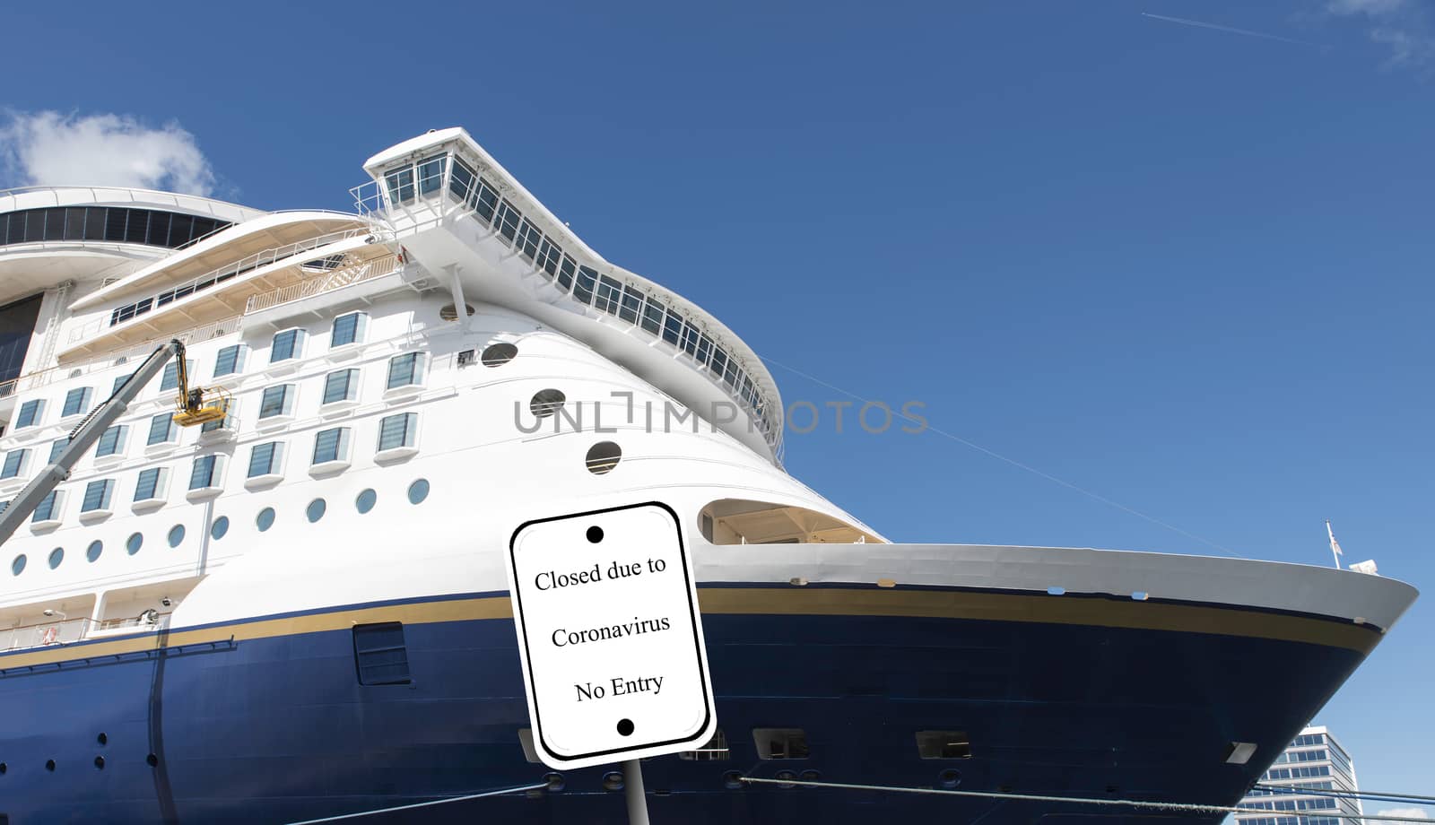 cruiseship with blue sky background waiting in the harbour for the next trip