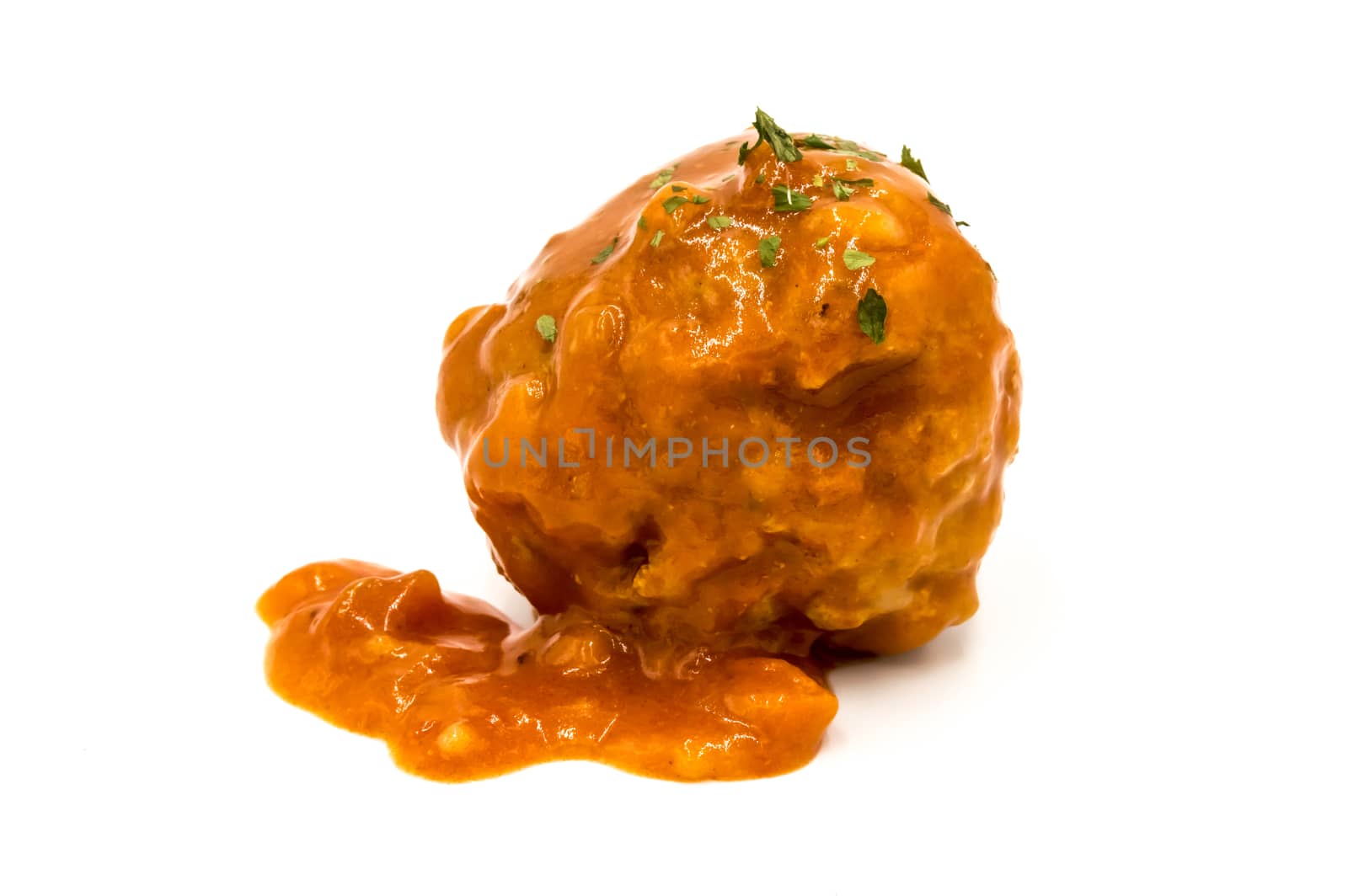 Meatball cooked in tomato sauce with on a white background